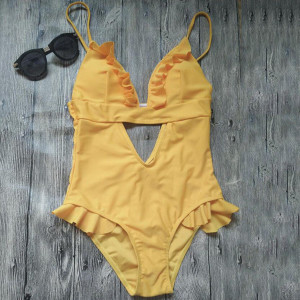 Jednodijelni žuti kupaći kostim s volanima